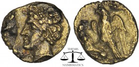 CILICIA, Uncertain. 4th century BC. AR Obol. Head left, wearing wreath of grain ears / Eagle, with spread wings, standing left. SNG France 474; SNG Le...