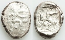 PAMPHYLIA. Aspendus. Ca. late-5th century BC. AR stater (23mm, 10.66 gm). Fine, overstruck. Helmeted nude hoplite advancing right, shield in left hand...