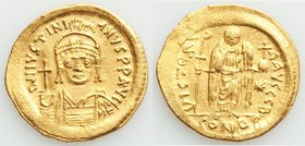 Justinian I the Great (AD 527-565). AV solidus (21mm, 4.45 gm, 6h). XF, graffiti. Constantinople, 2nd officina. D N IVSTINI-ANVS PP AVG, cuirassed bus...
