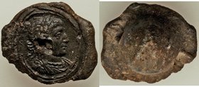 ANTIQUITIES. Constantine I the Great (AD 307-337). Lead seal. Portrait of Constantine in an oval setting / Raised back with suspension hole through th...