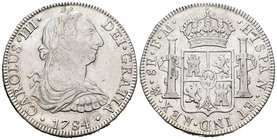Carlos III (1759-1788). 8 reales. 1784. México. FM. (Cal-936). Ag. 27,01 g. Canto liso en parte. MBC+. Est...70,00.