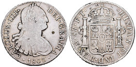 Carlos IV (1788-1808). 8 reales. 1803. México. FT. (Cal-699). Ag. 26,75 g. Pequeños resellos orientales. BC+. Est...70,00.