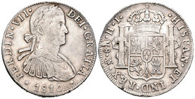 Fernando VII (1808-1833). 8 reales. 1810. México. (Cal-543). Ag. 26,77 g. Busto imaginario. Pequeño resello oriental y golpecito de punzón en reverso....