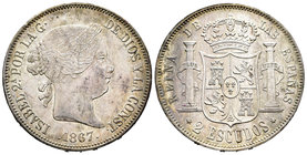 Isabel II (1833-1868). 2 escudos. 1867. Madrid. (Cal-204). Ag. 25,89 g. Rayita en anverso. Tono. EBC+/SC-. Est...300,00.