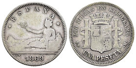 Gobierno Provisional (1868-1871). 1 peseta. 1869*_ _-_ _. Madrid. SNM. (Cal-15). Ag. 4,83 g. Leyenda ESPAÑA. BC. Est...30,00.