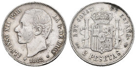 Alfonso XII (1874-1885). 2 pesetas. 1882*18-82. Madrid. MSM. (Cal-51). Ag. 9,89 g. BC+. Est...25,00.