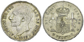 Alfonso XII (1874-1885). 5 pesetas. 1885*18-85). Madrid. PGM. (Vti-115Fd). Ag. 24,14 g. No coincidente. 22 barras en escudete. Girado alrededor del ej...