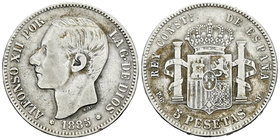 Alfonso XII (1874-1885). 5 pesetas. 1885*_8-8_. Madrid. PGM. (Vti-115Fd). Ag. 23,94 g. No coincidente. Veintidos barras en escudete. Trazo lardo de la...