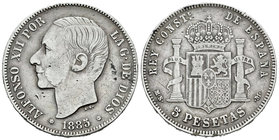 Alfonso XII (1874-1885). 5 pesetas. 1885*18-87. Madrid. MSM. (Vti-117F). Ag. 24,42 g. Coincidente. 21 barras en el escudete. MBC-. Est...18,00.