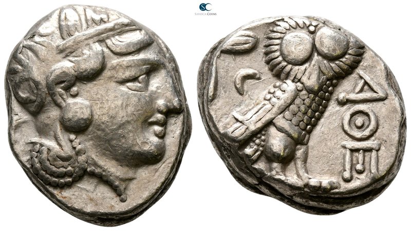 Attica. Athens 350-294 BC. Tetradrachm AR

23mm., 16,70g.

Head of Athena wi...