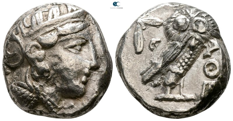Attica. Athens 350-294 BC. Tetradrachm AR

22mm., 17,80g.

Head of Athena wi...