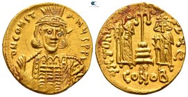 Constantine IV, with Heraclius and Tiberius AD 668-685. Struck circa AD 668-673. Constantinople. 5th officina. Solidus AV