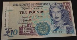 Guernsey, 10 Pounds, 2015, UNC, p-UNL
serial number: F600183, Signature Bethan Haines, Portrait of Queen Elizabeth II at Front and Thomas de la Rue a...