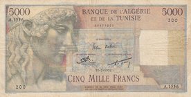 Tunisia, 5000 Francs, 1956, VF (+), p27
serial number: 200.A.1556
Estimate: $ 100-200