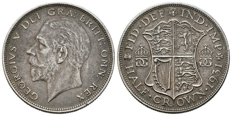 Gran Bretaña. George V. 1/2 crorona. 1931. (Km-835). Ag. 14,16 g. Pátina oscura....