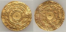 Fatimid. al-Mu'izz (AH 341-365 / AD 953-975) gold Dinar AH 343 (AD 955/6) VF, al-Mansuriyya mint, A-697.1, SICA-295. 21.5mm. 4.03gm.

HID09801242017