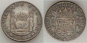 Charles III 8 Reales 1769 LM-JM About XF, Lima mint, KM-A64.2. With dot above one "L" in mint marks. 38.8mm. 26.80gm. 

HID09801242017