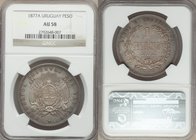 Republic Peso 1877-A AU58 NGC, Paris mint, KM17. Dusty blue, rose and gold toning. 

HID09801242017
