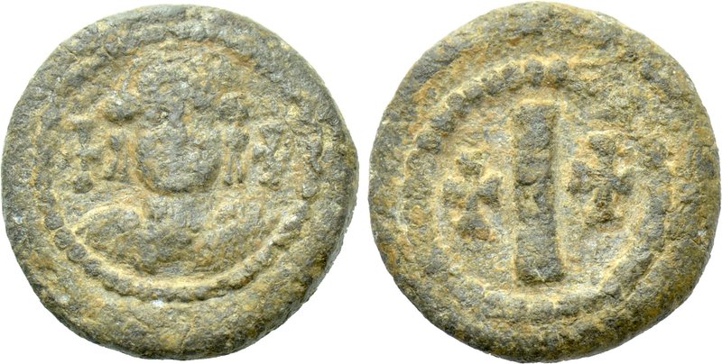 MAURICE TIBERIUS (582-602). Lead Decanummium. Uncertain Italian mint.

Obv: Cr...