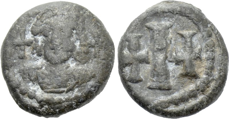 MAURICE TIBERIUS (582-602). Lead Decanummium. Uncertain Italian mint.

Obv: Cr...