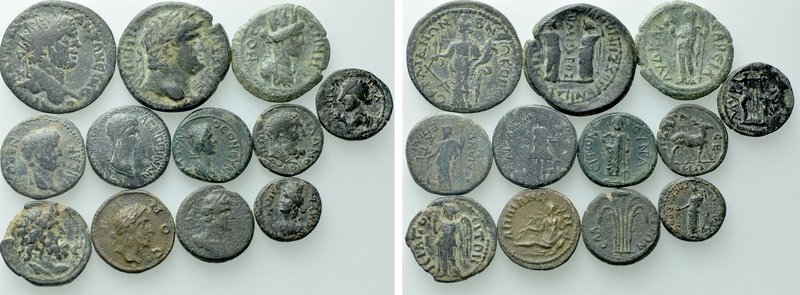 12 Roman Provincial Coins. 

Obv: .
Rev: .

. 

Condition: See picture.
...