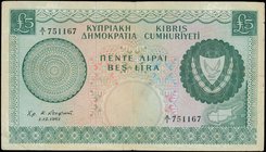 CYPRUS: 5 Pounds (1.12.1961) in dark green on multicolor unpt with Arms at right and map at lower right. WMK: Eagles head. Printed by BWC (without imp...