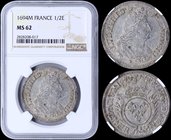 FRANCE: 1/2 Ecu (1694 M) in silver (0,917). Obv: Louis XIV. Mint: Toulouse. Inside slab by NGC "MS 62". Top grade in both companies. (KM 295.13).