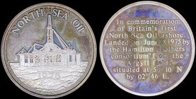 GREAT BRITAIN: Silver medal commemorating Britains first North Sea Oil ashore (1975). The oil was brought ashore in June, 1975 as part of the initial ...