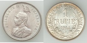 German Colony. Wilhelm II Rupie 1914-J UNC, Hamburg mint, KM10. 30.6mm. 11.66gm. Obverse displays a florescent gold-blue tone while reverse is white w...