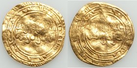 Fatimid. al-Zahir (AH 411-427 / AD 1021-1036) gold Dinar ND About VF (wavy flan), al-Mahdiya mint, A-714.1. 21.9mm. 4.01gm. Date obscured.

HID0980124...
