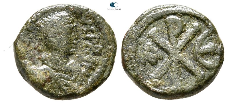 Justin I AD 518-527. Constantinople
Pentanummium Æ

14 mm., 1,86 g.



ne...