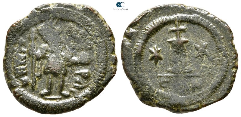 Justin II AD 565-578. Constantinople
Decanummium Æ

23 mm., 5,09 g.



ve...