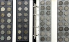 Deutsche Münzen ab 1871
Album mit 188 Kleinmünzen Kaiserreich und Weimar. U.a. 46 X 1/2 Mark J. 16, 26 X 1 Mark J. 9/17 (dabei z.B. 1879 A und 1909 E...