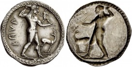 Greek Coins 
 Bruttium, Caulonia. Nomos circa 525-500 BC, AR 8.25 g. 
 Description KAVL Apollo, diademed, walking r., holding laurel branch in uprai...