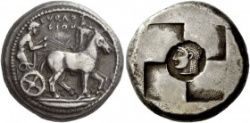 Greek Coins 
 Sicily, Syracuse. Tetradrachm circa 510-500 BC, AR 17.24 g. 
 Description SURAKO / SIWN Slow quadriga driven r. by charioteer, wearing...