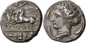 Greek Coins 
 Sicily, Syracuse. Decadrachm signed by Kimon circa 404-400 BC, AR 43.21 g. 
 Description Fast quadriga driven l. by charioteer, holdin...
