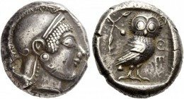 Greek Coins
Attica, Athens. Tetradrachm circa 490-480 BC, AR 17.70 g.
Description Helmeted head of Athena r. Rev. AQE Owl standing r. with closed wi...