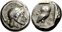 Greek Coins 
 Attica, Athens. Tetradrachm circa 500/490-485/0 BC, AR 17.11 g. 
 Description Head of Athena r. wearing crested Attic helmet. Rev. AQE...