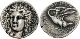 Greek Coins 
 Ionia, Clazomenae. Tetradrachm circa 380-360, AR 15.20 g. 
 Description Laureate head of Apollo facing slightly to l. Rev. KLAZOM – [E...