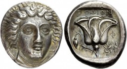 Greek Coins 
 Islands off Caria, Rhodes. Tetradrachm circa 404-385 BC, AR 15.23 g. 
 Description Head of Helios facing three-quarters r. Rev. POΔION...