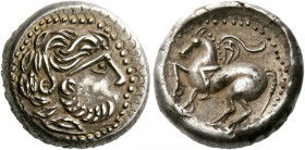 Celtic coins 
 Middle and Lower Danube Celts. Tetradrachm imitating types of Philip II of Macedonia, 1st century BC, AR 13.85 g. 
 Description Laure...