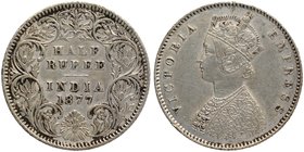 Silver Half Rupee Coin of Victoria Empress of Calcutta Mint of 1877.