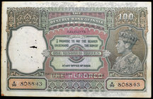 One Hundred Rupees Bank Note of King George VI signed by C.D. Deshmukh of 1938 of Calcutta Circle.
