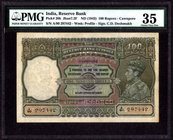 PMG Graded Rare CAWNPORE Circle One Hundred Rupees Note of King George VI signed by C.D. Deshmukh of 1938.