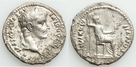 Tiberius (AD 14-37). AR denarius (19mm, 3.53 gm, 12h). XF, horn silver, pitting. Lugdunum. TI CAESAR DIVI-AVG F AVGVSTVS, laureate head of Tiberius ri...