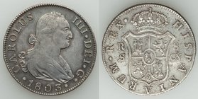 Charles IV 8 Reales 1803 S-CN VF, Seville mint, KM432.2. 40.3mm. 26.67gm. Possible old time cleaning but if so it has re-toned to a beautiful gunmetal...