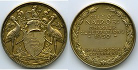 Pair of Uncertified African Medals, 1) Kenya gilt-silver "Nairobi Charter" Medal 1950 - UNC. 51.1mm. 61.94gm 2) Zimbabwe silver "Opening of Bank Note ...