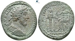 Ionia. Ephesos. Marcus Aurelius AD 161-180. Struck circa AD 161-165. Homonoia issue with Tralleis. Bronze Æ