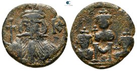 Constans II, with Constantine IV, Heraclius, and Tiberius AD 641-668. Struck circa AD 666-668. Constantinople. Follis Æ. Class 11a