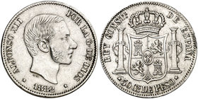 1882. Alfonso XII. Manila. 50 centavos. (Cal. 22). 12,99 g. Golpecitos. Ex Colección Manuela Etcheverría. MBC/MBC+.